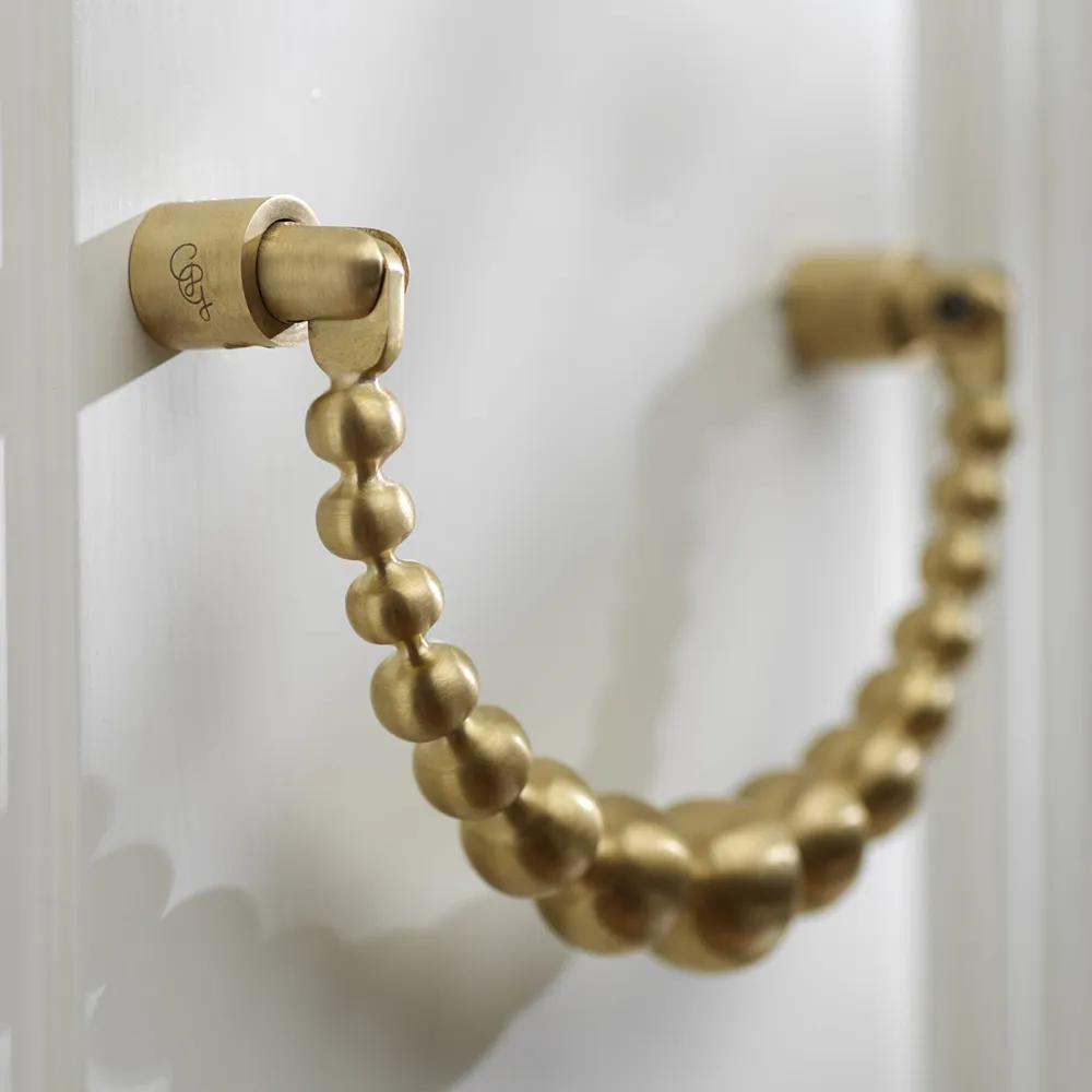 Ovenkoputtaja Brushed brass